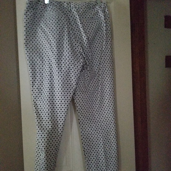A polka dotted ruffled dress  and pants - Picture 5 of 5